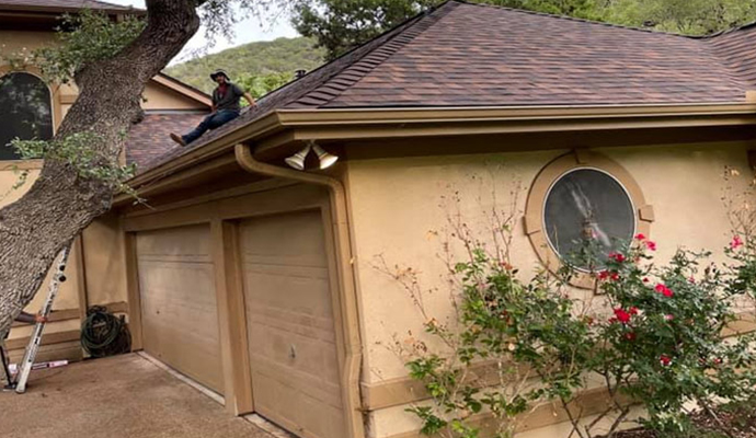 Residential house with restored gutter system Beautiful residential house featuring a fully restored gutter system